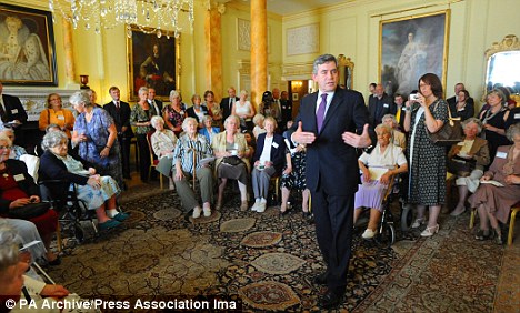 Honour: Gordon Brown at a ceremony at No10, acknowledging the contribution to the Second World War effort of around 50 surviving members - including Clara Stokes - of the Women's Land Army and the Women's Timber Corps