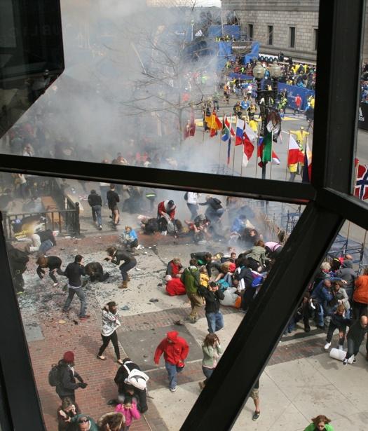 This Monday April 15, 2013 photo provided by Ben Thorndike shows the scene following an explosion at the Boston Marathon.