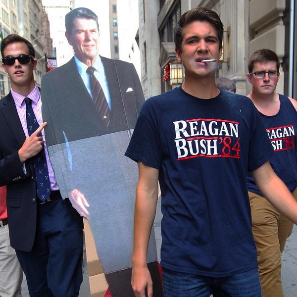 Students counter protested environmental demonstrators on Wall Street Tuesday by carrying a life-size cutout of President Ronald Reagan to the iconic financial location. (Image source: Campbell Moore)